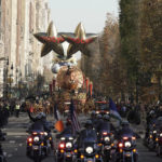 
              The Tom Turkey float leads the way down Central Park West during the Macy's Thanksgiving Day Parade, Thursday, Nov. 24, 2022, in New York. (AP Photo/Jeenah Moon)
            