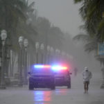 
              Police patrol the Hollywood Beach Broadwalk as conditions deteriorate with the approach of Hurricane Nicole, Wednesday, Nov. 9, 2022, in Hollywood Beach in Hollywood, Fla. (AP Photo/Wilfredo Lee)
            