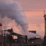 Smoke rises from the Borealis plant in Ottmarsheim, eastern France, Tuesday, Nov.8, 2022. Just back from the U.N. climate summit in Egypt, French President Emmanuel Macron is to meet Tuesday with the heads of the country's most climate-damaging industries to pressure them to reduce greenhouse gases emissions, amid growing competition from the U.S. and China. (AP Photo/Jean-Francois Badias)