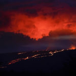 
              Lava erupts from Hawaii's Mauna Loa volcano Wednesday, Nov. 30, 2022, near Hilo, Hawaii. (AP Photo/Gregory Bull)
            