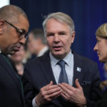 
              Britain's Foreign Secretary James Cleverly, left, talks with Finland's Foreign Minister Pekka Haavisto, center, and Canada's Foreign Minister Melanie Joly during the first day of the meeting of NATO Ministers of Foreign Affairs, in Bucharest, Romania, Tuesday, Nov. 29, 2022. (AP Photo/Andreea Alexandru)
            