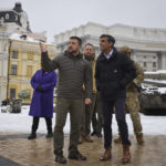 
              In this photo provided by the Ukrainian Presidential Press Office, Ukrainian President Volodymyr Zelenskyy, left, and British Prime Minister Rishi Sunak observe destroyed Russian military vehicles installed in downtown Kyiv, Ukraine, Saturday, Nov. 19, 2022. (Ukrainian Presidential Press Office via AP)
            