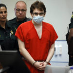 
              Marjory Stoneman Douglas High School shooter Nikolas Cruz enters the courtroom for his sentencing hearing at the Broward County Courthouse in Fort Lauderdale, Fla. on Tuesday, Nov. 1, 2022. Cruz was sentenced to life in prison for murdering 17 people more in 2018. (Amy Beth Bennett/South Florida Sun Sentinel via AP, Pool)
            