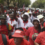 
              Civil servants take part in a protest march in Pretoria, Tuesday, Nov. 22, 2022. Seven unions in the public service face an uphill battle as they press on with their national day of action which will be the country's third national one-day strike by organised labour this year alone. (AP Photo/Alet Pretorius)
            