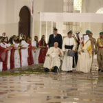 
              Pope Francis talks with Bahrain's King Hamad bin Isa Al Khalifa as he leaves the Sakhir Royal Palace, Bahrain, Thursday, Nov. 3, 2022. Pope Francis is making the November 3-6 visit to participate in a government-sponsored conference on East-West dialogue and to minister to Bahrain's tiny Catholic community, part of his effort to pursue dialogue with the Muslim world. (AP Photo/Alessandra Tarantino)
            