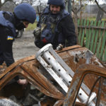 
              Ukrainian sappers inspect territory during a demining operation of a residential area in Novoselivka, Donetsk region, Ukraine, Wednesday, Nov. 16, 2022. (AP Photo/Andriy Andriyenko)
            