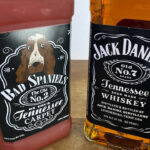 
              A bottle of Jack Daniel's Tennessee Whiskey is displayed next to a Bad Spaniels dog toy in Arlington, Va., Sunday, Nov. 20, 2022. Jack Daniel's has asked the Supreme Court justices to hear its case against the manufacturer of the toy. (AP Photo/Jessica Gresko)
            