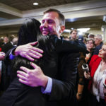 
              Tom Kean Jr., GOP candidate for New Jersey’s 7th Congressional District, hugs a supporter at his election night party held in Basking Ridge N.J., Tuesday, Nov. 8, 2022. (AP Photo/Stefan Jeremiah)
            