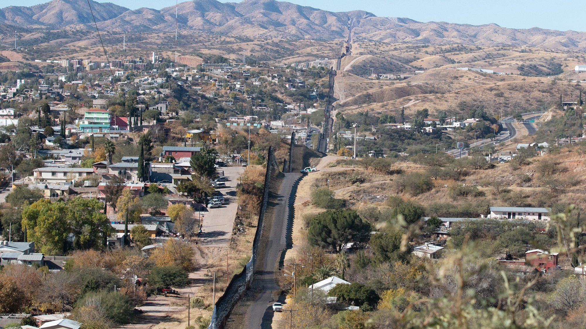 The city of Nogales, Sonora, Mexico sits just across the border fence from Nogales, Arizona,. It is...