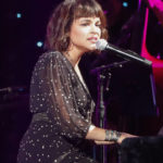 
              FILE - Norah Jones performs at "Willie: Life & Songs Of An American Outlaw" on  Jan. 12, 2019, in Nashville, Tenn. The soundtrack to the popular holiday special “A Charlie Brown Christmas” has sold more than five million copies.  Jones included her version of the song “Christmas Time is Here" on a holiday album "I Dream of Christmas" released last year. (Photo by Al Wagner/Invision/AP, File)
            