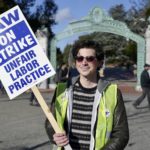 
              Jonathan Mackris, a doctorate student at the University of California, Berkeley, poses for a photo on campus in Berkeley, Wednesday, Dec. 7, 2022. Mackris is one of thousands of University of California academic workers on strike to demand higher wages and better benefits. A month into the nation's largest strike involving higher education, the work stoppage is causing stress for many students who are facing canceled classes, no one to answer their questions and uncertainty about how they will be graded as they wrap up the year. (AP Photo/Terry Chea)
            