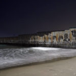 
              The border fence ends at the Pacific Ocean Tuesday, Dec. 20, 2022, in Tijuana, Mexico. The U.S. government made its plea in a filing a day after Chief Justice John Roberts issued a temporary order to keep the pandemic-era limits on migrants in place. (AP Photo/Marcio Jose Sanchez)
            