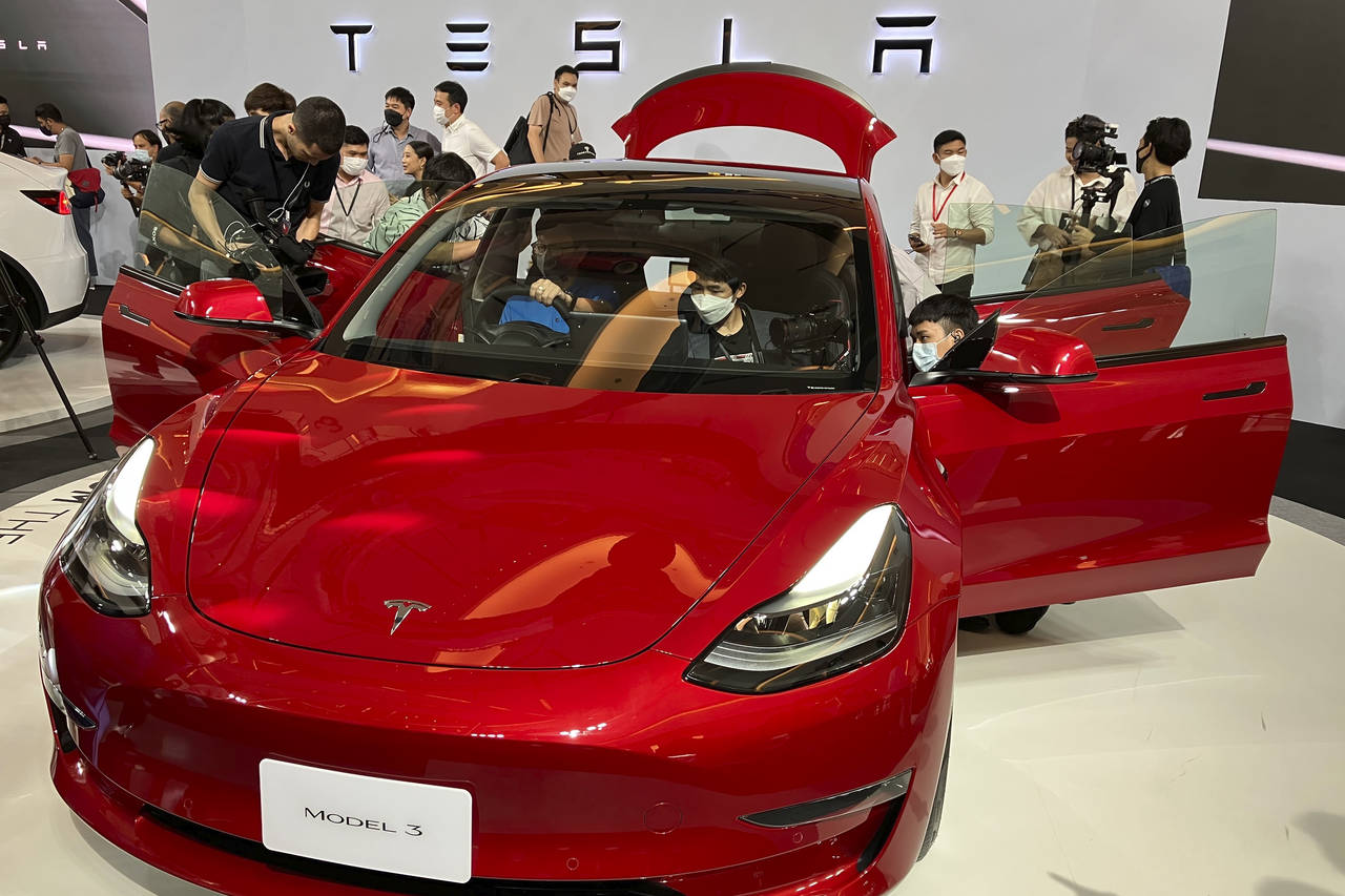 Tesla electric vehicles are displayed during a public launching event Wednesday, Dec. 7, 2022, in B...