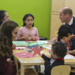 
              Britain's Prince William and Kate, Princess of Wales, left, chat with participants of the Young Mother's Program at Roca Thursday, Dec. 1, 2022, in Chelsea, Mass. (AP Photo/Reba Saldanha, Pool)
            