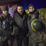 
              In this photo provided by the Ukrainian Presidential Press Office, Ukrainian servicewomen pose for a photo with President Volodymyr Zelenskyy, center, during his visit to Sloviansk, Donbas region, Ukraine, Tuesday, Dec. 6, 2022. (Ukrainian Presidential Press Office via AP)
            