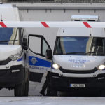 
              Officers stand by a police van as they leave the grounds of the courthouse complex after the trial of David Hunter in the southwest coastal city of Paphos, Cyprus, Monday, Dec. 5, 2022. A British man facing a premeditated murder charge over the death of his ill wife in Cyprus’ coastal resort town of Paphos is expected to plead guilty to the lesser charge of manslaughter on Dec. 13, with the court to pass sentence at a later date, a state prosecutor said Monday. (AP Photo/Petros Karadjias)
            