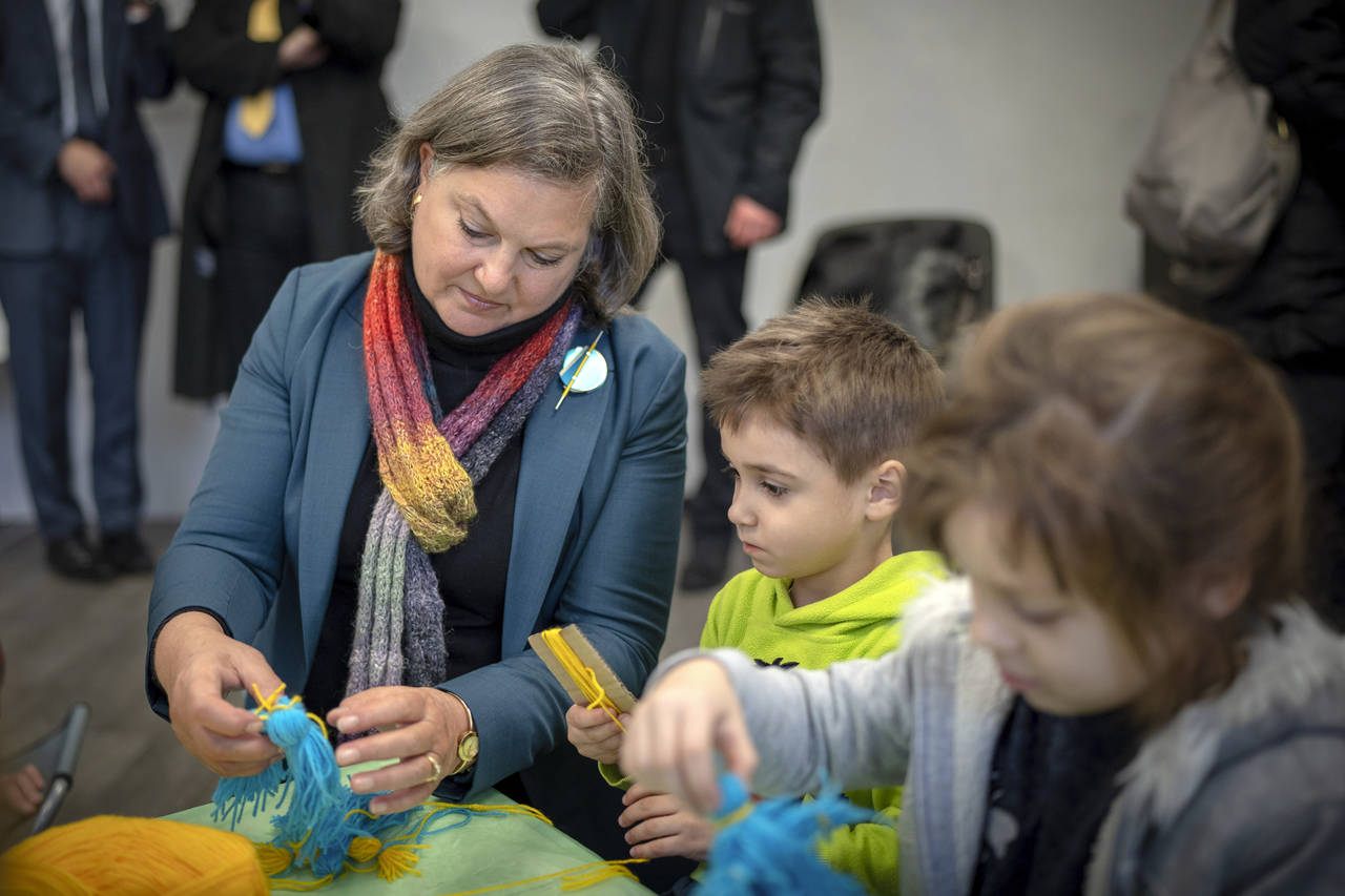 Under Secretary of State for Political Affairs Victoria Nuland, plays with children who have been d...