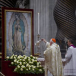 
              Cardinal Marc Ouellet asperges incense on a picture of our lady of Guadalupe during a mass in her honor presided over by Pope Francis in St. Peter's Basilica at The Vatican, Monday, Dec. 12, 2022. (AP Photo/Gregorio Borgia)
            