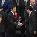 
              Philippines President Ferdinand Marcos, center right, shakes hands with the Sultan of Brunei Hassanal Bolkiah, center left, during the opening ceremony at an EU-ASEAN summit in Brussels, Wednesday, Dec. 14, 2022. EU and ASEAN leaders meet in Brussels for a one day summit to discuss the EU-ASEAN strategic partnership, trade relations and various international topics. (AP Photo/Geert Vanden Wijngaert)
            