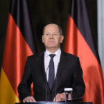 
              German Chancellor Olaf Scholz briefs the media after a virtual meeting of the G7 leaders, at the chancellery in Berlin, Germany, Monday, Dec. 12, 2022. (AP Photo/Markus Schreiber)
            