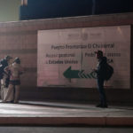 
              Russian migrant family members stand by the border with the U.S. Tuesday, Dec. 20, 2022, in Tijuana, Mexico. The U.S. government made its plea in a filing a day after Chief Justice John Roberts issued a temporary order to keep the pandemic-era limits on migrants in place. (AP Photo/Marcio Jose Sanchez)
            