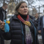 
              Under Secretary of State for Political Affairs Victoria Nuland holds a doll made by children who have been driven from their homes in the country's eastern and southern regions because of the war, as she talks to the media in Kyiv, Ukraine, Saturday, Dec. 3, 2022. (AP Photo/Roman Gritsyna)
            