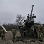 
              Ukrainian soldiers prepare to fire a French-made CAESAR self-propelled howitzer towards Russian positions near Avdiivka, Donetsk region, Ukraine, Monday, Dec. 26, 2022. (AP Photo/Libkos)
            