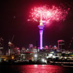 
              Fireworks explode over Sky Tower in central Auckland as New Year celebrations begin in New Zealand, Sunday, Jan. 1, 2023. (Dean Purcel/NZ Herald via AP)
            