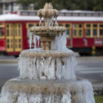 
              The fountain is frozen as temperatures hovered in the mid 20's at Jacob Schoen & Son Funeral Home in New Orleans, Saturday, Dec. 24, 2022.  Millions of Americans are facing blinding blizzards, freezing rain, flooding and life-threatening cold through Christmas as a winter storm of unprecedented scope smashes its frigid way through most of the country.(David Grunfeld/The Advocate via AP)
            