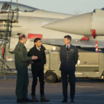 
              Air Chief Marshal Mike Wigston, left and Station Commander for RAF Coningsby Billy Cooper walk with Britain's Prime Minister Rishi Sunak during his visit to RAF Coningsby in Lincolnshire, England, Friday, Dec. 9, 2022,  following the announcement that Britain will work to develop next-generation fighter jets with Italy and Japan. (Joe Giddens/Pool Photo via AP)
            