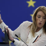 
              European Parliament President Roberta Metsola takes notes during a special session on lobbying Monday, Dec. 12, 2022 at the European Parliament in Strasbourg, eastern France. Four people have been charged with being part of a criminal group, money laundering and corruption in connection with an investigation into suspected influence peddling by a Persian Gulf country at the European Union's parliament. (AP Photo/Jean-Francois Badias)
            