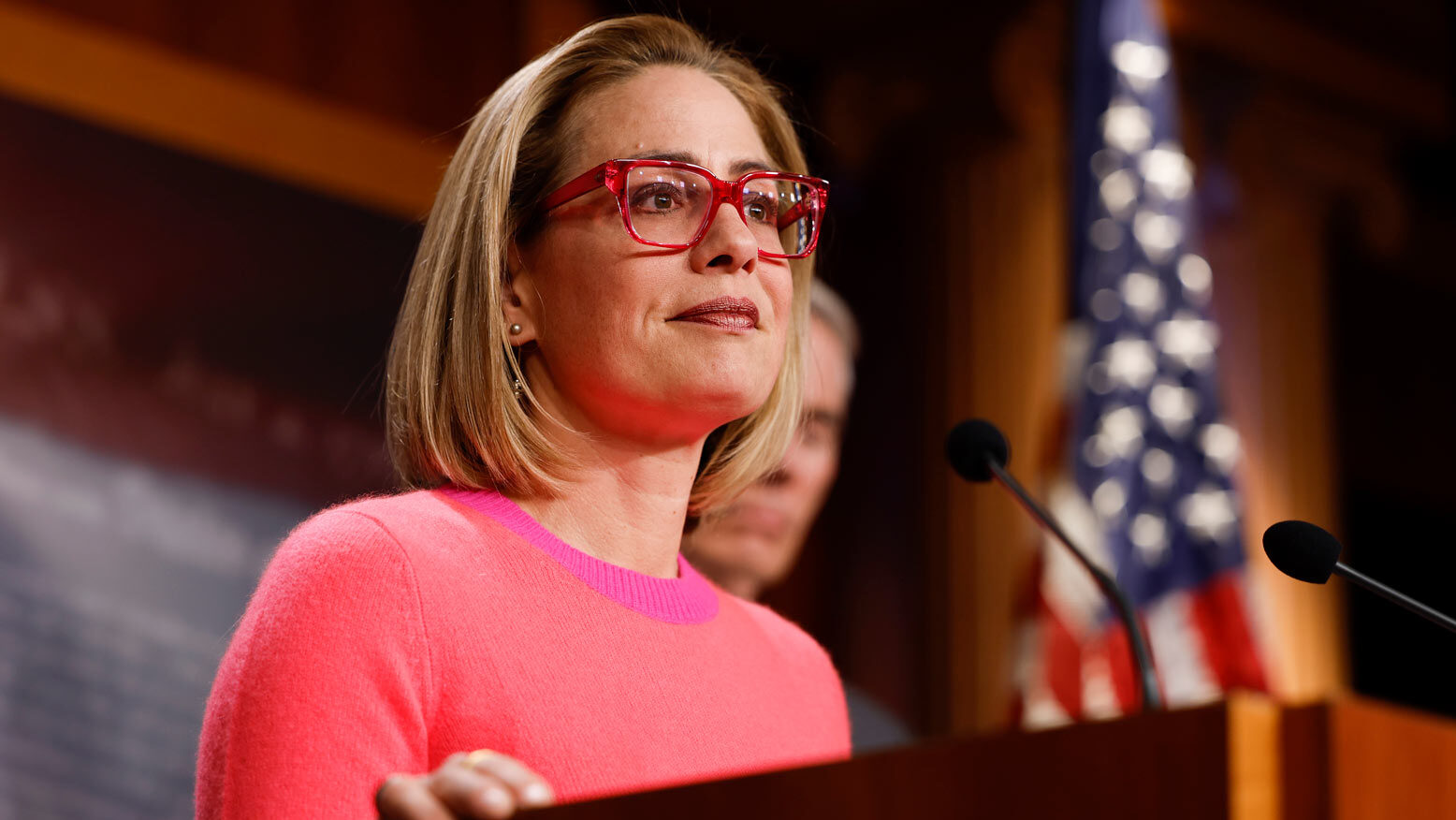 U.S. Sen. Kyrsten Sinema speaks at a news conference after the Senate passed the Respect for Marria...