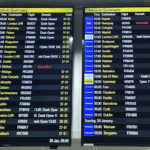 
              The departure boards at Manchester Airport showing two cancelled Flybe flights, in Manchester, England, Saturday Jan. 28, 2023. Struggling U.K. airline Flybe has collapsed for the second time in less than three years. The flyer initially limped into bankruptcy in March 2020, with the loss of 2,400 jobs. It was relaunched in April 2022 with hedge fund backing, but has called in the bankruptcy accountants once again after less than 12 months back in the air. (Peter Byrne/PA via AP)
            
