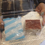 
              CORRECTS THE PHOTOGRAPHER'S NAME TO KWIYEON HA - A customer holds whale meat purchased from a vending machine at Kyodo Senpaku's unmanned store, Thursday, Jan. 26, 2023, in Yokohama, Japan. The Japanese whaling operator, after struggling for years to promote its controversial products, has found a new way to cultivate clientele and bolster sales: whale meat vending machines. (AP Photo/Kwiyeon Ha)
            
