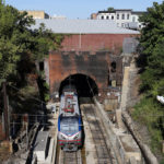 
              FILE - An Amtrak train emerges from the Baltimore and Potomac Tunnel in Baltimore,  Sept. 15, 2015. The tunnel is finally slated to be replaced with help from the $1 trillion bipartisan infrastructure legislation championed by Biden, and he plans to visit on Monday to talk about the massive investment. (AP Photo/Patrick Semansky, File)
            