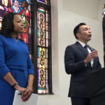 
              Assistant Attorney General of the U.S. Department of Justice's Civil Rights Division Kristen Clarke, left, listens as United States Attorney Martin Estrada, of the California central division, speaks while announcing the largest redlining case in American history during a news conference Thursday, Jan. 12, 2023, at the Second Baptist Church in Los Angeles. (AP Photo/Stefanie Dazio)
            