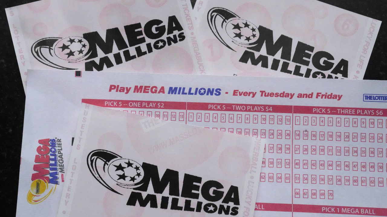 FILE - Mega Millions lottery tickets and a wager slip are displayed, Friday, Jan. 6, 2023, in Derry...