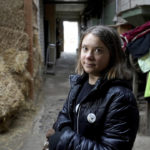 
              Swedish climate campaigner Greta Thunberg looks on during an interview with the Associated Press Erkelenz, Germany, Saturday, Jan. 14, 2023. Ahead of a demonstration in which she will take part nearby on Saturday, Thunberg on Friday visited the tiny village of Luetzerath and took a look at the nearby Garzweiler open coal mine. (AP Photo/Michael Probst)
            