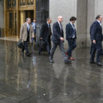 
              Cryptocurrency entrepreneur Sam Bankman-Fried, second from right, arrives for an appearance at Manhattan federal court Tuesday, Jan. 3, 2023, in New York.  Bankman-Fried will be arraigned in a Manhattan federal court Tuesday on charges that he cheated investors and looted customer deposits on his cryptocurrency trading platform. (AP Photo/Craig Ruttle)
            