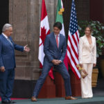 
              Obrador's wife Beatriz Gutiérrez Müller, right, and Trudeau's wife Sophie Grégoire Trudeau, second from right, move off stage for a group photo with President Joe Biden, Mexican President Andres Manuel Lopez Obrador, and Canadian Prime Minister Justin Trudeau, at an arrival ceremony at the 10th North American Leaders' Summit at the National Palace in Mexico City, Tuesday, Jan. 10, 2023. (AP Photo/Andrew Harnik)
            