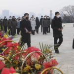 
              North Koreans visit and pay respect to the statues of late leaders Kim Il Sung and Kim Jong Il on Mansu Hill in Pyongyang, North Korea Sunday, Jan. 22, 2023 on the occasion of the Lunar New Year. (AP Photo/Jon Chol Jin)
            