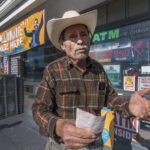 
              Roberto Ramirez, 77, from Guadalajara, Mexico holds a SuperLotto Plus ticket at the gas station that previously sold the $2.04 billion-winning Powerball ticket award at Joe's Service Center, a Mobil gas station at Woodbury Road and Fair Oaks Avenue in Altadena, Calif., Friday, Jan. 6, 2023. Lottery players whose numbers didn't hit or who forgot to even buy a ticket will have another shot at a nearly $1 billion Mega Millions prize. The estimated $940 million jackpot up for grabs Friday night has been growing for more than two months and now ranks as the sixth-largest in U.S history. (AP Photo/Damian Dovarganes)
            