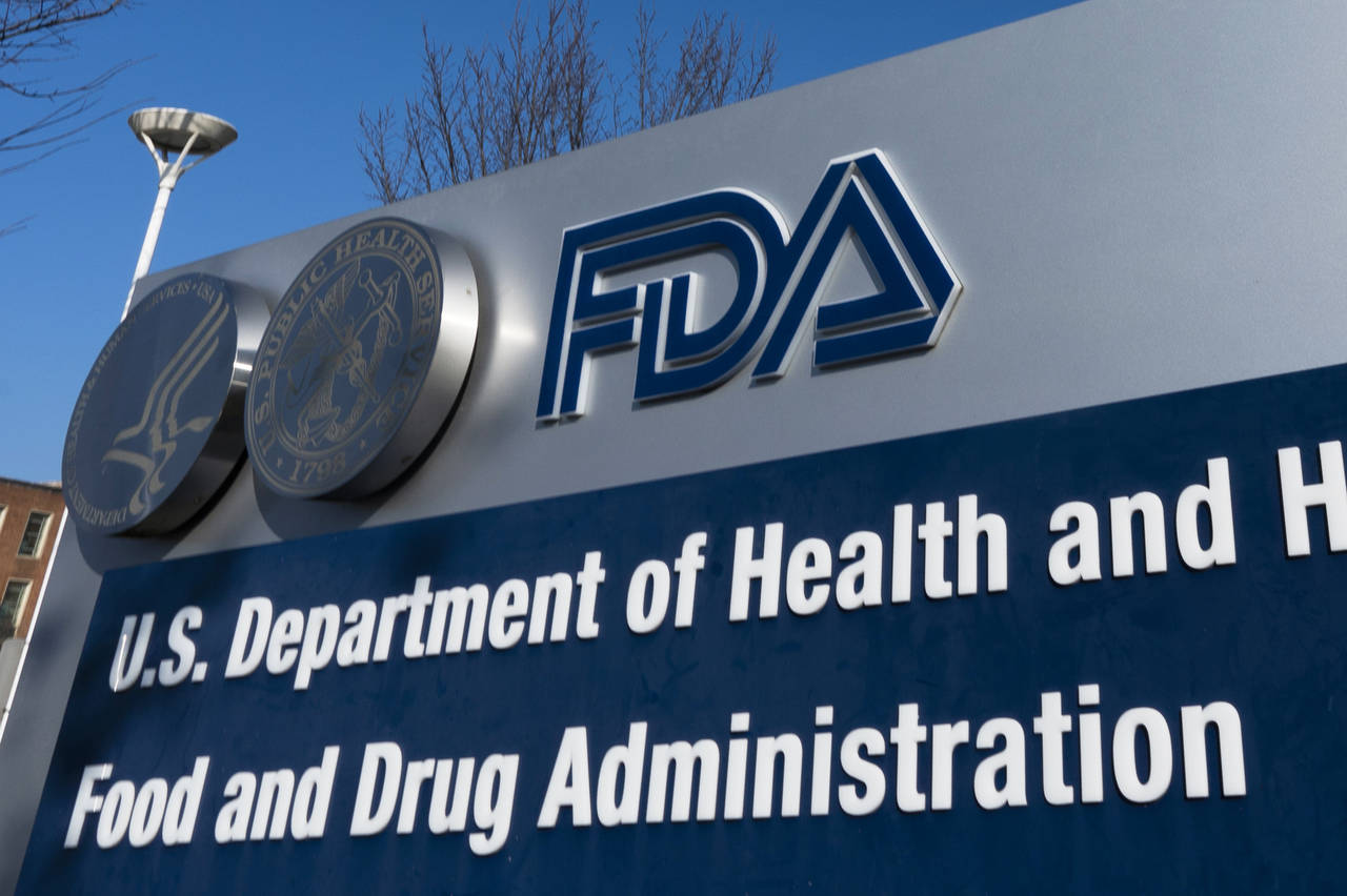 FILE - A sign for the Food and Drug Administration is displayed outside their offices in Silver Spr...