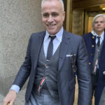 
              Fashion designer Thom Browne leaves Manhattan federal court, Thursday, Jan. 12, 2023, in New York,  after a jury decided he did not infringe the trademark of sportswear giant Adidas. (AP Photo/Larry Neumeister)
            