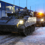 
              Britain's armoured vehicles prepare to move at the Tapa Military Camp, in Estonia, Thursday, Jan. 19, 2023. Britain's Defense Secretary Ben Wallace said his country would send at least three batteries of AS-90 artillery, armored vehicles, thousands of rounds of ammunition and 600 Brimstone missiles, as well as the squadron of Challenger 2 tanks. (AP Photo/Pavel Golovkin)
            