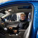 
              Energy Secretary Jennifer Granholm gets into the passenger seat for a demonstration of a Chevy Bolt EUV all electric vehicle during a visit to the Washington Auto Show in Washington, Wednesday, Jan. 25, 2023. (AP Photo/Andrew Harnik)
            