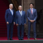 
              President Joe Biden, Mexican President Andres Manuel Lopez Obrador, and Canadian Prime Minister Justin Trudeau meet at the 10th North American Leaders' Summit at the National Palace in Mexico City, Tuesday, Jan. 10, 2023. (Adrian Wyld/The Canadian Press via AP)
            