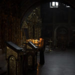 
              A woman prays at the St. Michael's Golden-Domed Monastery in Kyiv, Ukraine, Tuesday Jan. 31, 2023. (AP Photo/Daniel Cole)
            