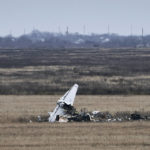 
              Fragments of a military plane are seen near Kherson, Ukraine, Saturday, Jan. 7, 2023. (AP Photo/Libkos)
            