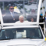 
              Pope Francis greets well-wishers after arriving in Kinshasa, Congo, Tuesday Jan. 31, 2023. Francis is in Congo and South Sudan for a six-day trip, hoping to bring comfort and encouragement to two countries that have been riven by poverty, conflicts and what he calls a "colonialist mentality" that has exploited Africa for centuries. (AP Photo/Jerome Delay)
            